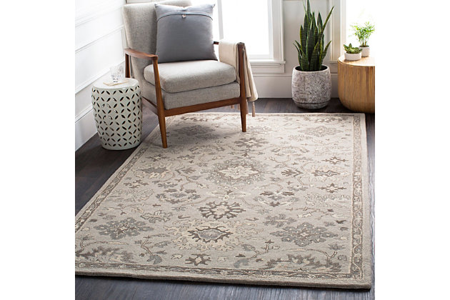 Dress up any floor with the natural hue and designer look of this rug. It welcomes visitors with warmth and comfort underfoot. Neutral color palette exudes a marvelously modern vibe which works wonders in any setting.Made of wool | Hand-tufted | Medium pile | Canvas backing; rug pad recommended | Wool fibers are prone to shedding, vacuum regularly and shedding will subside | Imported | Spot clean only
