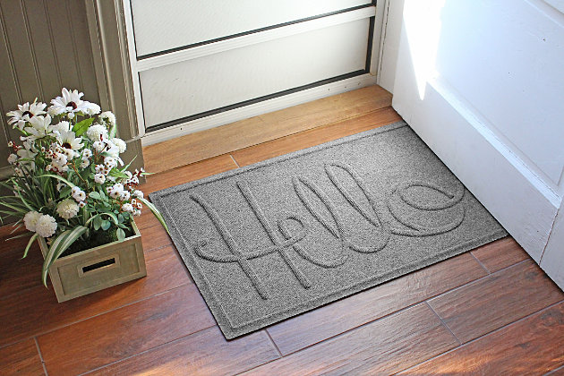 From the front door to the back door and all points in between, the Aqua Shield hello doormat is sure to keep your floors clean and dry. Beyond scraping dirt from shoes and paws, it’s got an exclusive “water dam” design for unbeatable absorbency. Resistant to the most extreme weather elements, this doormat is certified slip resistant by the National Floor Safety Institute. Talk about one heck of a welcome mat.Made of polypropylene with rubber backing | Machine made | Crush proof | Raised border keeps dirt and water in the mat, not on your floor | Absorbs one gallon of water per square yard | Mold/mildew/fade resistant | Anti-static and weather resistant | Suitable for indoor/outdoor use | Hose clean, then hang to dry or dry flat | Made in u.s.a.
