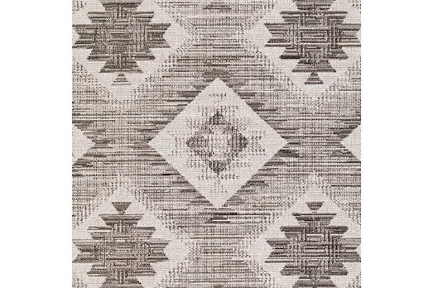 Dress up any floor with the soft hues and energetic feel of this tribal rug. It welcomes visitors with warmth and comfort underfoot. Dynamic design is sure to add interest to your living space.Made of polypropylene | Machine woven | Low pile | Rug pad recommended | Spot clean | Imported