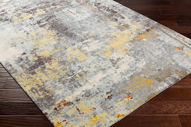 Stri abstract patterned rug leaves so much to the imagination. Its ethereal design dresses up a room with brilliant color, visual texture and a highly contemporary point of view. Made of polyester | Machine woven | Low pile | Rug pad recommended | Spot clean | Imported