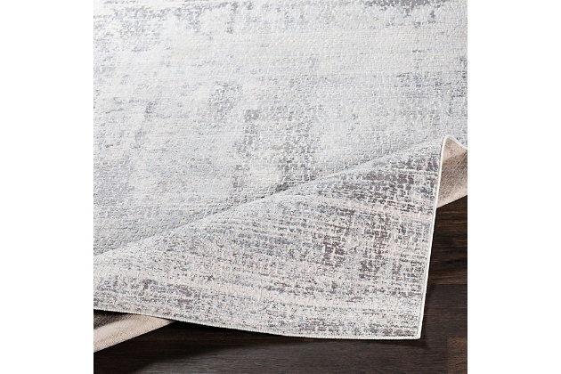 Made in the fade. Sporting a weathered effect for a relaxed sensibility, this area rug conveys what peaceful living is all about. Easy-care construction and exceptional versatility make it a practical choice for any space you please.Made of polyester | Machine woven |  pile | No bac; rug pad recommended | Spot clean | Imported