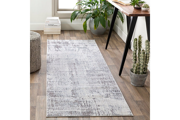 Made in the fade. Sporting a weathered effect for a relaxed sensibility, this area rug conveys what peaceful living is all about. Easy-care construction and exceptional versatility make it a practical choice for any space you please.Made of polyester | Machine woven | Medium pile | No backing; rug pad recommended | Spot clean | Imported