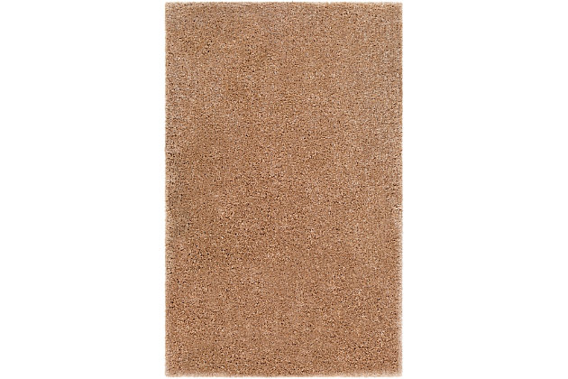 Dress up any floor with the natural hue and designer look of this rug. It welcomes visitors with warmth and comfort underfoot. Neutral color palette exudes a marvelously modern vibe which works wonders in any setting.Made of polyester | Handwoven | Shag pile | Rug pad recommended | Spot clean | Imported