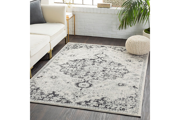 Simply timeless and beautifully on trend, this masterfully crafted Moroccan style area rug is distressed to impress. Easy elegant and casually cool, it looks right at home whether your furnishings are retro, boho or somewhere in between.Made of polypropylene | Machine woven | Medium pile | Rug pad recommended | Spot clean | Imported