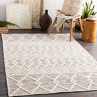 Made in the fade. Sporting a weathered effect for a relaxed sensibility, this area rug conveys what peaceful living is all about. Easy-care construction and exceptional versatility make it a practical choice for any space you please.100% wool | Handwoven | No pile | Rug pad recommended | Spot clean | Imported