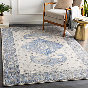 Merging symmetry with an organic sense of flow, this rug is out of this world in terms of tone and texture. Classic border design provides such rich shade variation, taking your floors to a whole new level.Made of polypropylene | Machine woven | Medium pile | Rug pad recommended | Spot clean | Imported