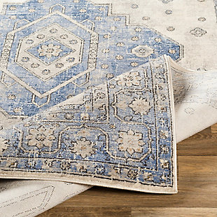 Merging symmetry with an organic sense of flow, this rug is out of this world in terms of tone and texture. Classic border design provides such rich shade variation, taking your floors to a whole new level.Made of polypropylene | Machine woven | Medium pile | Rug pad recommended | Spot clean | Imported