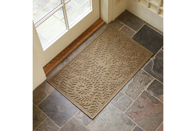 From the front door to the back door and all points in between, the Aqua Shield boxwood doormat with floral twist pattern is sure to keep your floors clean and dry. Beyond scraping dirt from shoes and paws, it’s got an exclusive “water dam” design for unbeatable absorbency. Resistant to the most extreme weather elements, this doormat is certified slip resistant by the National Floor Safety Institute. Talk about one heck of a welcome mat.Made of polypropylene with rubber backing | Machine made | Crush proof | Raised border keeps dirt and water in the mat, not on your floor | Absorbs one gallon of water per square yard | Mold/mildew/fade resistant | Anti-static and weather resistant | Suitable for indoor/outdoor use | Hose clean, then hang to dry or dry flat | Made in u.s.a.