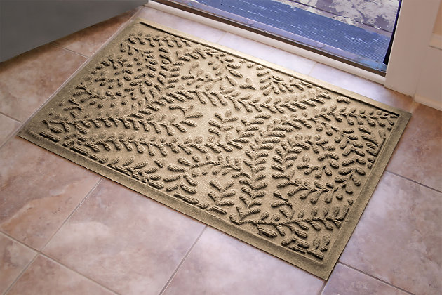 From the front door to the back door and all points in between, the Aqua Shield boxwood doormat with floral twist pattern is sure to keep your floors clean and dry. Beyond scraping dirt from shoes and paws, it’s got an exclusive “water dam” design for unbeatable absorbency. Resistant to the most extreme weather elements, this doormat is certified slip resistant by the National Floor Safety Institute. Talk about one heck of a welcome mat.Made of polypropylene with rubber backing | Machine made | Crush proof | Raised border keeps dirt and water in the mat, not on your floor | Absorbs one gallon of water per square yard | Mold/mildew/fade resistant | Anti-static and weather resistant | Suitable for indoor/outdoor use | Hose clean, then hang to dry or dry flat | Made in u.s.a.