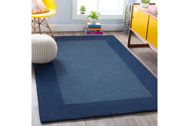 Talk about blending in yet standing out. While decidedly simple, this multitonal rug is wonderfully complex upon closer inspection. If you’re looking for colorful inspiration, you’ll love its host of  bold hues. Exuding an easy-elegant sensibility, this versatile area rug works equally well in formal places and casually cool spaces.100% wool | Hand-loomed | High pile | Rug pad recommended | Spot clean | Imported | Canvas backing