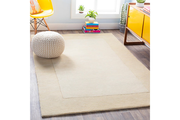 Talk about blending in yet standing out. While decidedly simple, this multitonal rug is wonderfully complex upon closer inspection. If you’re looking for neutral inspiration, you’ll love its host of mellow hues. Exuding an easy-elegant sensibility, this versatile area rug works equally well in formal places and casually cool spaces.100% wool | Hand-loomed | High pile | Rug pad recommended | Spot clean | Imported