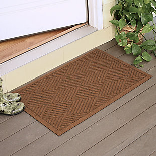 From the front door to the back door and all points in between, the Aqua Shield diamonds doormat with lattice pattern is sure to keep your floors clean and dry. Beyond scraping dirt from shoes and paws, it’s got an exclusive “water dam” design for unbeatable absorbency. Resistant to the most extreme weather elements, this doormat is certified slip-resistant by the National Floor Safety Institute. Talk about one heck of a welcome mat.Made of polypropylene with rubber backing | Machine made | Crush proof | Raised border keeps dirt and water in the mat, not on your floor | Absorbs one gallon of water per square yard | Mold/mildew/fade resistant | Anti-static and weather resistant | Suitable for indoor/outdoor use | Hose clean, then hang to dry or dry flat | Made in u.s.a.