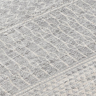 Dress up any floor with the natural hue and designer look of this rug. It welcomes visitors with warmth and comfort underfoot. Neutral color palette exudes a marvelously modern vibe which works wonders in any setting.Made of  polypropylene | Machine woven | Medium pile | No backing; rug pad recommended | Spot clean | Imported