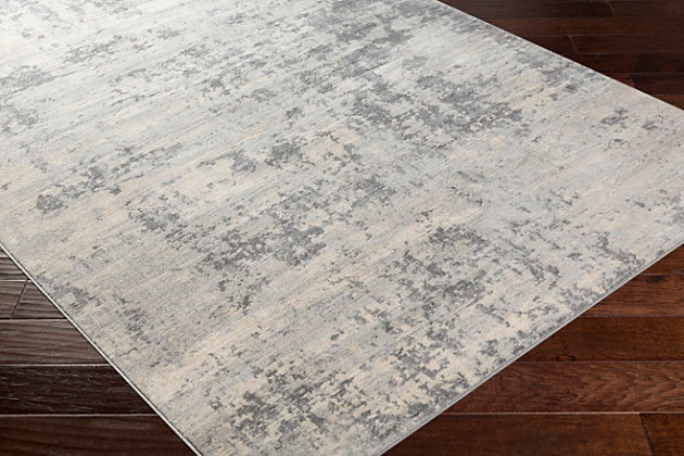 Made in the fade. Sporting a weathered effect for a relaxed sensibility, this area rug conveys what peaceful living is all about. Easy-care construction and exceptional versatility make it a practical choice for any space you please.Made of polypropylene | Machine woven | Medium pile | Rug pad recommended | Spot clean | Imported