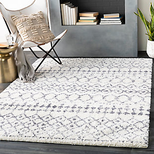 Indulge in retro revival with this sumptuous shag rug with striking geometric design. Plush pile is loaded with fun, feel-good texture. Harmonious hues make it a tasteful choice for so many spaces.Made of polypropylene and polyester | Machine woven | Shag pile | Rug pad recommended | Imported | Spot clean only
