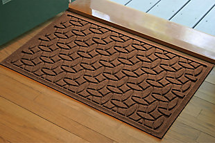 From the front door to the back door and all points in between, the Aqua Shield ellipse doormat with modern geometric pattern is sure to keep your floors clean and dry. Beyond scraping dirt from shoes and paws, it’s got an exclusive “water dam” design for unbeatable absorbency. Resistant to the most extreme weather elements, this doormat is certified slip-resistant by the National Floor Safety Institute. Talk about one heck of a welcome mat.Made of polypropylene with rubber backing | Machine made | Crush proof | Raised border keeps dirt and water in the mat, not on your floor | Absorbs one gallon of water per square yard | Mold/mildew/fade resistant | Anti-static and weather resistant | Suitable for indoor/outdoor use | Hose clean, then hang to dry or dry flat | Made in u.s.a.
