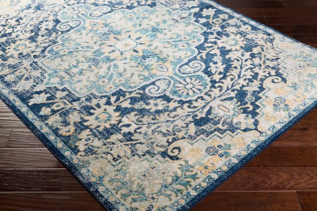 Tasteful design and harmonious hues impart a timeless look to any space. This highly versatile area rug is the perfect marriage of traditional and contemporary styles. It’s a sophisticated yet relaxed aesthetic that feels right at home.Made of polypropylene | Machine woven | Medium pile | Rug pad recommended | Imported | Spot clean only