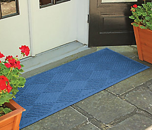 From the front door to the back door and all points in between, the Aqua Shield diamonds runner is sure to keep your floors clean and dry. Beyond scraping dirt from shoes and paws, it’s got an exclusive “water dam” design for unbeatable absorbency. Resistant to the most extreme weather elements, this runner is certified slip-resistant by the National Floor Safety Institute. Talk about one heck of a welcome mat.Made of polypropylene with rubber backing | Machine made | Crush proof | Raised border keeps dirt and water in the mat, not on your floor | Absorbs one gallon of water per square yard | Mold/mildew/fade resistant | Anti-static and weather resistant | Suitable for indoor/outdoor use | Hose clean, then hang to dry or dry flat | Made in u.s.a.