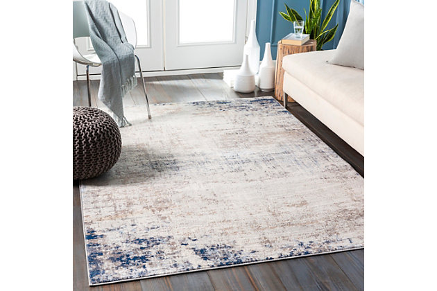 Made in the fade. Sporting a weathered effect for a relaxed sensibility, this area rug conveys what casual living is all about. Easy-care construction and exceptional versatility make it a practical choice for any space you please.Made of polypropylene | Machine woven | No pile | Rug pad recommended  | Spot clean | Imported