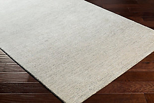 Dress up any floor with the natural hue and designer look of this rug. It welcomes visitors with warmth and comfort underfoot. Neutral color palette exudes a marvelously modern vibe which works wonders in any setting.Made of wool and viscose | Hand-tufted | Medium pile | Rug pad recommended  | Spot clean | Imported