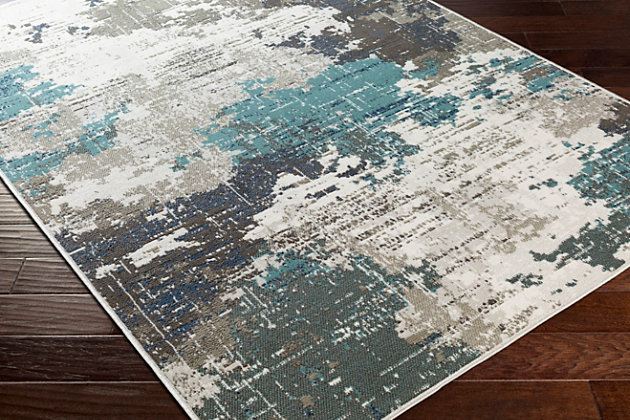 Striking abstract patterned rug leaves so much to the imagination. Its ethereal design dresses up a room with brilliant color, visual texture and a highly contemporary point of view. Made of polypropylene | Machine woven | Medium pile | Rug pad recommended  | Spot clean | Imported