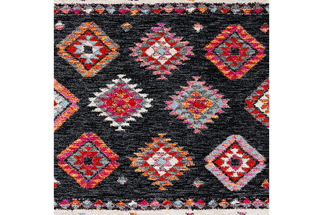 Dress up any floor with the bold hues and energetic feel of this tribal rug. It welcomes visitors with warmth and comfort underfoot. Dynamic design is sure to add interest to your living space.Made of  polypropylene | Machine woven | Medium pile | Jute backing; rug pad recommended | Spot clean | Imported