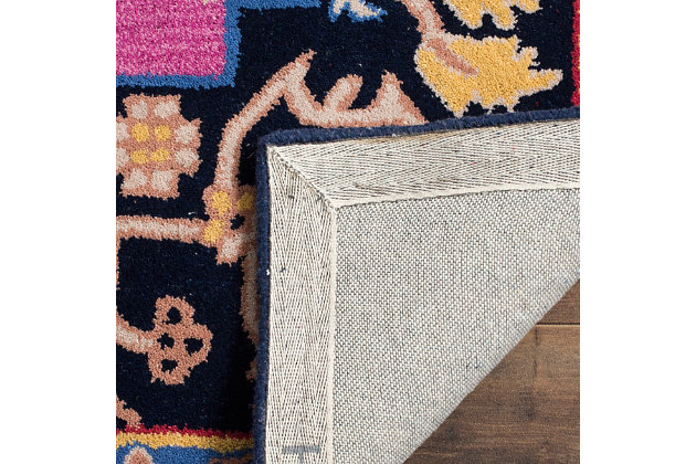 Why play it safe, when you can transform a space with big, bold and brilliant color? Saturated with deep, dramatic hues, this designer area rug stands out from the crowd for all the right reasons.100% wool | Hand-tufted | Medium pile | Rug pad recommended | Spot clean | Imported