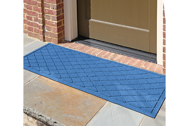 From garage to mudroom, hallway to kitchen, porch to patio, the Aqua Shield argyle runner with lattice pattern is sure to keep your floors clean and dry. Beyond scraping dirt from shoes and paws, it’s got an exclusive “water dam” design for unbeatable absorbency. Resistant to the most extreme weather elements, this runner is certified slip-resistant by the National Floor Safety Institute. Talk about one heck of a welcome mat.Made of polypropylene with rubber backing | Machine made | Crush proof | Raised border keeps dirt and water in the mat, not on your floor | Absorbs one gallon of water per square yard | Mold/mildew/fade resistant | Anti-static and weather resistant | Suitable for indoor/outdoor use | Hose clean, then hang to dry or dry flat | Made in u.s.a.
