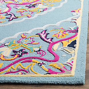 Tasteful design and harmonious hues impart a timeless look to any space. This highly versatile area rug is the perfect marriage of traditional and contemporary styles. It’s a sophisticated yet relaxed aesthetic that feels right at home.100% wool | Hand-tufted | Medium pile | Rug pad recommended | Spot clean | Imported