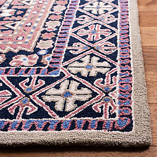 Why play it safe, when you can transform a space with big, bold and brilliant color? Saturated with deep, dramatic hues, this designer area rug stands out from the crowd for all the right reasons.100% wool | Hand-tufted | Medium pile | Cotton canvas (with latex) backing; rug pad recommended | Spot clean | Imported