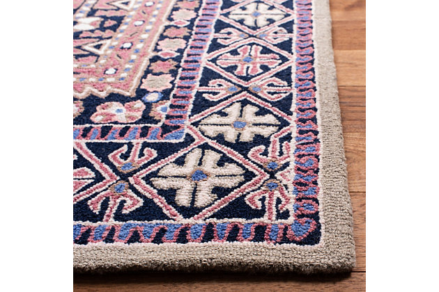 Why play it safe, when you can transform a space with big, bold and brilliant color? Saturated with deep, dramatic hues, this designer area rug stands out from the crowd for all the right reasons.100% wool | Hand-tufted | Medium pile | Cotton canvas (with latex) backing; rug pad recommended | Spot clean | Imported