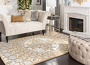 What a footloose and fancy-free feeling this rug brings to your living space. Boho-chic rug is cool and creative. Sturdy construction and intricately shaded yarns make for pure artistry designed to hold up beautifully to everyday living.100% wool | Hand-tufted | Medium pile | Rug pad recommended | Spot clean | Imported