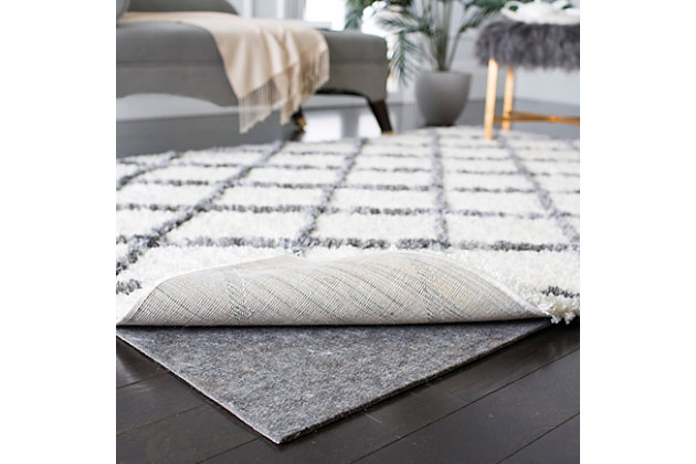 A rug pad is recommended for use with most types of area rugs. Rug padding is relatively inexpensive and is indispensable in helping to extend the life and maintain the inherent beauty of area rugs.Made of pvc foam and polyester | Machine loomed | Prevents scratching of the floor and extends the life of your rug | Easily cleaned by hand-washing in mild detergent, rinsed and laid flat to dry | Can be cut to fit the desired area rug size | Imported