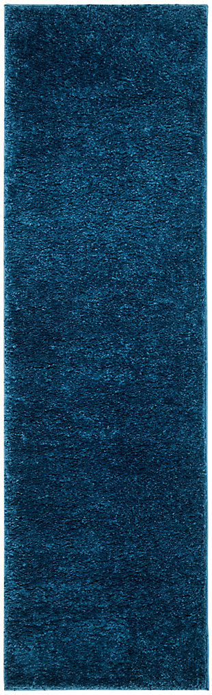 Indulge in retro revival with this sumptuous shag rug. Plush pile is loaded with fun, feel-good texture. Monochromatic hue makes it a tasteful choice for so many spaces.Made of polyester | Machine made | Shag pile | Jute and poly/cotton backing; rug pad recommended | Imported | Spot clean only