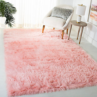 Take a walk on the wild side with this versatile faux sheepskin rug. The luxurious pile is a comfy complement to any decor. Layer on the floor, the bed or the seat of a chair for an utterly indulgent effect.Made of japanese acrylic | Machine made | High pile | Imported | Spot clean only
