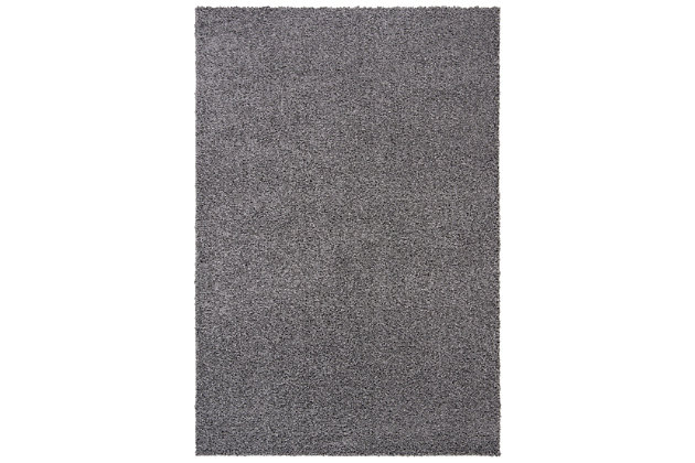 Indulge in retro revival with this sumptuous shag rug. Plush pile is loaded with fun, feel-good texture. Monochromatic hue makes it a tasteful choice for so many spaces.Made of  polypropylene | Machine woven | Shag pile | Jute and latex backing; rug pad recommended | Spot clean | Imported