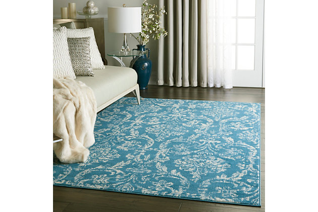 Smart and sophisticated, the jubilant collection presents contemporary rugs with fresh new looks and modern color palettes. Beautifully appealing in pastel shades of pink, blue, and grey, each rug features a durable low-pile construction from low-maintenance, easy-care fibers that will blend perfectly into any casual boho setting. Dramatically distressed color effects and ornate european damask designs bring a vintage antique vibe to this jubilant collection area rug. Striated ivory patterns on a blue field bring an authentic elegance to your favorite room, with a sleek low pile of easy-care fibers.Power loomed | Easy-care fibers | Low shedding | Low-pile