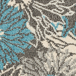 Rich, lush, seductive color draws you in to the plush beauty of the lovely passion collection. If you thrill to the pleasures of beautifying your home, you'll find passion area rugs simply irresistible. These fantastic florals, stunning abstracts and dramatic geometric designs meld elements of classic persian motifs with a modern sensibility. Woven of polypropylene fibers on state-of-the-art powerlooms, this collection of area rugs combines thick, comfortable pile with an easy-care approach. Advanced overdye techniques create an exciting patina effect. Live a more colorful life with passion in your home! Fabulous oversized florals capture the wow! Factor in this passion area rug. Its contemporary flair features a palette of soft charcoal and ivory, enlivened with touches of bright turquoise blue. Soft and inviting, it’s the ideal expression of modern comfort in any room.Power loomed | Easy-care fibers | Low shedding | Indoor only | Rug pad recommended