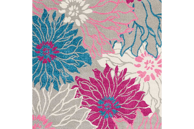Rich, seductive color draws you into the plush beauty of the passion collection. These fantastic florals and dramatic geometric designs meld elements of classic persian motifs with a bohemian sensibility. Woven from polypropylene fibers on state-of-the-art power looms, this collection of area rugs combines thick, comfortable pile with an easy-care approach. Advanced overdye techniques create an exciting patina effect in shades of pink, blue, and orange. Live a more colorful life with passion in your home! Oversized tropical blooms cover the surface of this passion collection rug, with shades of pink combining with more subtle blue and grey to create a bold color pop in any room. Combined with soft and easy-care pile, this floral pattern brings a bold, exotic vibe to your home.Power loomed | Serged edges | Low shedding | Indoor only | Rug pad recommended