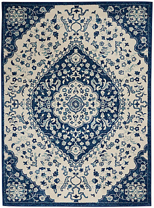 Rich, lush, seductive color draws you in to the plush beauty of the lovely Passion Collection. If you thrill to the pleasures of beautifying your home, you'll find Passion area rugs simply irresistible. These fantastic florals, stunning abstracts and dramatic geometric designs meld elements of classic Persian motifs with a modern sensibility. Woven of polypropylene fibers on state-of-the-art powerlooms, this collection of area rugs combines thick, comfortable pile with an easy-care approach. Advanced overdye techniques create an exciting patina effect. Live a more colorful life with Passion in your home! With a palette of deep blue and ivory, this lovely Passion area rug brings a soft touch of harmony to a special bedroom, living room, family or dining room. The center medallion, floral Persian design is beautifully balanced by four corner flourishes and finished with a narrow border. A serene choice for all kinds of décor, from contemporary to bohemian to French country.Power-loomed | Serged edges | Low shedding | Indoor Only | Rug pad recommended