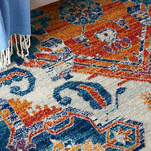 Rich, lush, seductive color draws you in to the plush beauty of the lovely Passion Collection. If you thrill to the pleasures of beautifying your home, you'll find Passion area rugs simply irresistible. These fantastic florals, stunning abstracts and dramatic geometric designs meld elements of classic Persian motifs with a modern sensibility. Woven of polypropylene fibers on state-of-the-art powerlooms, this collection of area rugs combines thick, comfortable pile with an easy-care approach. Advanced overdye techniques create an exciting patina effect. Live a more colorful life with Passion in your home! This delightful Passion area rug combines lively Persian floral motifs with brilliant color and borderless design for a vivid and modern effect. Gorgeous hues of lapis blue and saffron sparkle on the ivory ground. Soft and thick cut-pile has irresistible texture; finished with a serged edge.Power-loomed | Serged edges | Low shedding | Indoor Only | Rug pad recommended