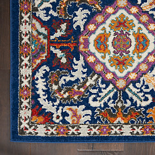 Rich, lush, seductive color draws you in to the plush beauty of the lovely Passion Collection. If you thrill to the pleasures of beautifying your home, you'll find Passion area rugs simply irresistible. These fantastic florals, stunning abstracts and dramatic geometric designs meld elements of classic Persian motifs with a modern sensibility. Woven of polypropylene fibers on state-of-the-art powerlooms, this collection of area rugs combines thick, comfortable pile with an easy-care approach. Advanced overdye techniques create an exciting patina effect. Live a more colorful life with Passion in your home! Like a treasure chest of jewels, this colorful Passion area rug pours forth an exciting array of gold, ruby and amethyst details, all richly displayed on a deep blue ground. This rug takes inspiration from Persian floral motifs, yet will work beautifully in the modern room. With serged edge, narrow border and the textural quality of soft cut-pile.Power-loomed | Serged edges | Low shedding | Indoor Only | Rug pad recommended