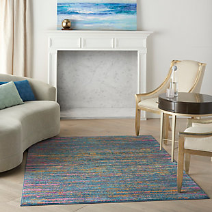 Rich, seductive color draws you into the plush beauty of the Passion Collection. These fantastic florals and dramatic geometric designs meld elements of classic Persian motifs with a bohemian sensibility. Woven from polypropylene fibers on state-of-the-art power looms, this collection of area rugs combines thick, comfortable pile with an easy-care approach. Advanced overdye techniques create an exciting patina effect in shades of pink, blue, and orange. Live a more colorful life with Passion in your home! Like a vista from another planet, this exciting abstract area rug visibly pulsates with colorful energy in sweeping striations across its soft, plush pile. A vivid astral palette with celestial blue, fuchsia and gold is seductively enthralling. Superbly modern in 100% polypropylene fibers with serged edge.Power-loomed | Serged edges | Low shedding | Indoor Only | Rug pad recommended