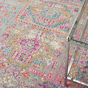 Rich, seductive color draws you into the plush beauty of the Passion Collection. These fantastic florals and dramatic geometric designs meld elements of classic Persian motifs with a bohemian sensibility. Woven from polypropylene fibers on state-of-the-art power looms, this collection of area rugs combines thick, comfortable pile with an easy-care approach. Advanced overdye techniques create an exciting patina effect in shades of pink, blue, and orange. Live a more colorful life with Passion in your home! This fantastic Passion area rug scintillates with color and pattern. It incorporates a variety of vintage Persian motifs, unified by an ornamental border. The lush colors and rich floral and geometric details sparkle in jewel tones with beautiful distressed effect across the soft pile.Power-loomed | Serged edges | Low shedding | Indoor Only | Rug pad recommended