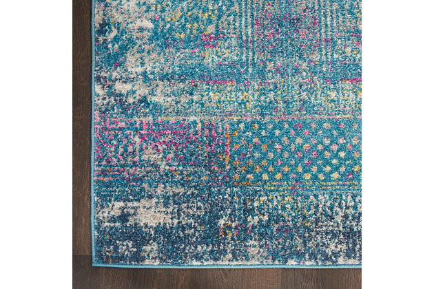 Rich, seductive color draws you into the plush beauty of the passion collection. These fantastic florals and dramatic geometric designs meld elements of classic persian motifs with a bohemian sensibility. Woven from polypropylene fibers on state-of-the-art power looms, this collection of area rugs combines thick, comfortable pile with an easy-care approach. Advanced overdye techniques create an exciting patina effect in shades of pink, blue, and orange. Live a more colorful life with passion in your home! A predominantly blue palette lends mystery to this fascinating, moroccan-motif area rug from the passion collection. Sensual hints of fuchsia and gold bring dynamic energy to its soft pile. Shimmering distressed effect adds vintage appeal to this breathtakingly beautiful rug.Power-loomed | Serged edges | Low shedding | Indoor only | Rug pad recommended
