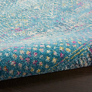 Rich, seductive color draws you into the plush beauty of the passion collection. These fantastic florals and dramatic geometric designs meld elements of classic persian motifs with a bohemian sensibility. Woven from polypropylene fibers on state-of-the-art power looms, this collection of area rugs combines thick, comfortable pile with an easy-care approach. Advanced overdye techniques create an exciting patina effect in shades of pink, blue, and orange. Live a more colorful life with passion in your home! A predominantly blue palette lends mystery to this fascinating, moroccan-motif area rug from the passion collection. Sensual hints of fuchsia and gold bring dynamic energy to its soft pile. Shimmering distressed effect adds vintage appeal to this breathtakingly beautiful rug.Power-loomed | Serged edges | Low shedding | Indoor only | Rug pad recommended
