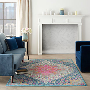 Rich, seductive color draws you into the plush beauty of the passion collection. These fantastic florals and dramatic geometric designs meld elements of classic persian motifs with a bohemian sensibility. Woven from polypropylene fibers on state-of-the-art power looms, this collection of area rugs combines thick, comfortable pile with an easy-care approach. Advanced overdye techniques create an exciting patina effect in shades of pink, blue, and orange. Live a more colorful life with passion in your home! This stunning passion area rug takes inspiration from vintage persian paisley design with a dramatic center medallion, floral background and corner flourishes. Beautiful and bright in pink, indigo, fuchsia and gold with the added pleasure of soft and textural cut-pile. Power-loomed of modern, easy-care fibers.Power-loomed | Serged edges | Low shedding | Indoor only | Rug pad recommended