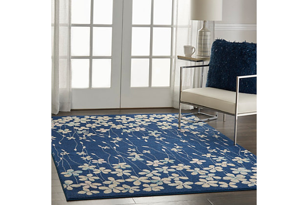 Nourison’s tranquil collection brings together a palette of soothing and elegant colors into an assortment of contemporary and traditional patterns, ranging from contemporary florals to intricate persian and kashan bordered medallion rugs. Each rug features a lush cut pile in easy-care fibers, with subtle abrash tones for touch of calming charm for any decor. Delicate flowers blow on a gentle breeze in this delightful botanical rug from the tranquil collection. Watercolor tones of pink and blue on a navy field create a marvelous sense of softness to bring a boho look to your unique decorating style.Power loomed | Easy-care fibers | Low shedding | Rug pad is recommended | Indoor only