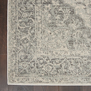 Nourison’s tranquil collection brings together a palette of soothing and elegant colors into an assortment of contemporary and traditional patterns, ranging from contemporary florals to intricate persian and kashan bordered medallion rugs. Each rug features a lush cut pile in easy-care fibers, with subtle abrash tones for touch of calming charm for any decor. Rethink traditional with this intriguing persian rug design from the tranquil collection. The oushak center-medallion style is expressed in the soft and subtle abrash tones of a soothing ivory-grey palette. It's a vintage look with contemporary appeal.Power loomed | Easy-care fibers | Low shedding | Rug pad is recommended | Indoor only