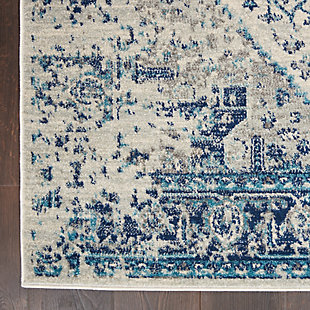 Nourison’s tranquil collection brings together a palette of soothing and elegant colors into an assortment of contemporary and traditional patterns, ranging from contemporary florals to intricate persian and kashan bordered medallion rugs. Each rug features a lush cut pile in easy-care fibers, with subtle abrash tones for touch of calming charm for any decor. A distressed ivory and grey field is adorned with navy blue and a hint of sky blue in this corner-and-medallion kashan rug design from the tranquil collection. Traditional abrash colors lend a vintage flavor to the overall effect, for an antique feel coupled with modern easy-care fibers.Power loomed | Easy-care fibers | Low shedding | Rug pad is recommended | Indoor only